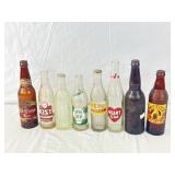 8 Antique Beer and Soda Bottles.