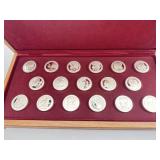 Set of 17 Olympic Tokens in Wooden Case