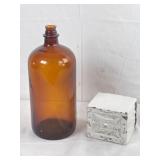 Brown Glass Jug & Enameled Brick