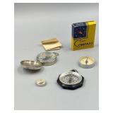 Four Vintage Compasses.