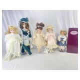Porcelain Dolls On stands.