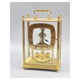 Gold Toned Mantel Clock. 9In T, 5 1/2In Wide.