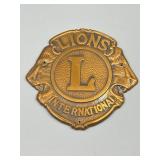 Copper Lions Clubs International Emblem.