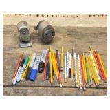 Pencil Sharpeners, Markers, And Pencils.