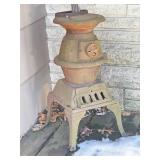 Cast Iron Potbelly Stove. 25In Tall, 13In Wide.