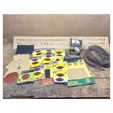 Sheets of Sand Paper, Belts and Dust Filter Masks.
