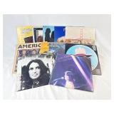 12 Vinyl Records: America Live, Holiday, Hat