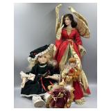 4 Porcelain Christmas Dolls