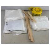 Assorted Painting Supplies and Caution