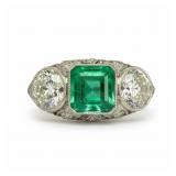 2 Ct Emerald With (2) 1.5Ct Diamonds Set in Platin