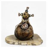 Robert Rivera Mudhead Sculpture with Acoma Pot