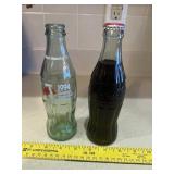 2 Coke Bottles
