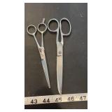 Two Pairs of Scissors