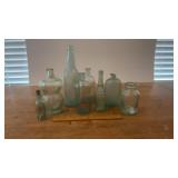 Lot of VIntage Light Green Glass Bottles