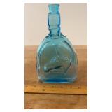 Blue Glass Horsehead Embossed Bottle