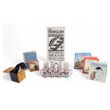 Group of Penguin Items Including Books, Glassware