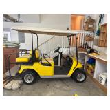 Yellow EZ GO Golf Cart