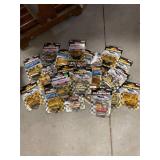 Assorted NASCAR stock cars with trading cards