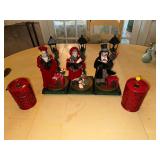 Battery Operated Christmas Carolers and Red Candle