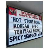 Korean Cafe + Sushi Outside Sign