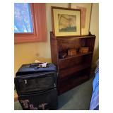 Bookshelf, Pictures, and Suitcase
