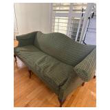 Traditional camelback sofa