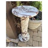 Pair of marble pedestal tables