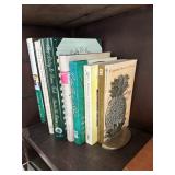 Assorted Books with Pineapple Book Ends