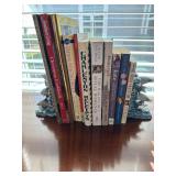 Assorted Books and Dolphin Bookends