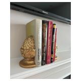 Assorted Books and Gold Pineapple Bookends