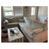 Light-colored Upholstered Sectional Sofa with Soft