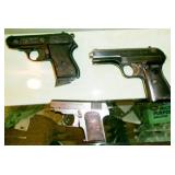 HAND GUNS