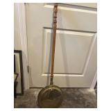 Heavy, brass bed warmer