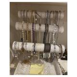no Iï¿½m bracelets and 24 necklaces