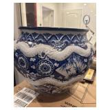 Blue/white ceramic planter. Repaired