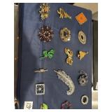 16 brooches