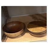 Wooden serving bowl and plates