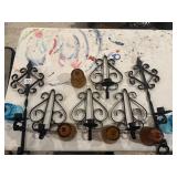 Ornate black metal sconces