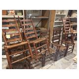 8 cherry ladder back chairs w/rush seating