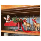 Santa, sleigh and reindeer one reindeer has been