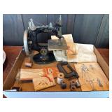 Childs/travel singer sewing machine, patterns, etc