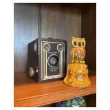 Vintage camera and owl bell