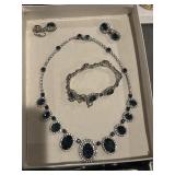 Matching necklace, bracelet, and earrings