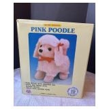 Pink poodle battery operated toy by JAMINA
