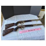 Resin gun wall decor.  One is repaired