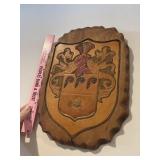 Carved wood coat of arms