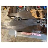 Two wood clamps and three hands saws