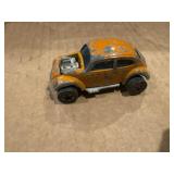 Orange, hot wheels, red line VW bug Volkswagen