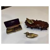 Brass ducks on base and US Military Gillette razor