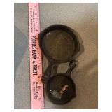 2 small cast iron skillets
